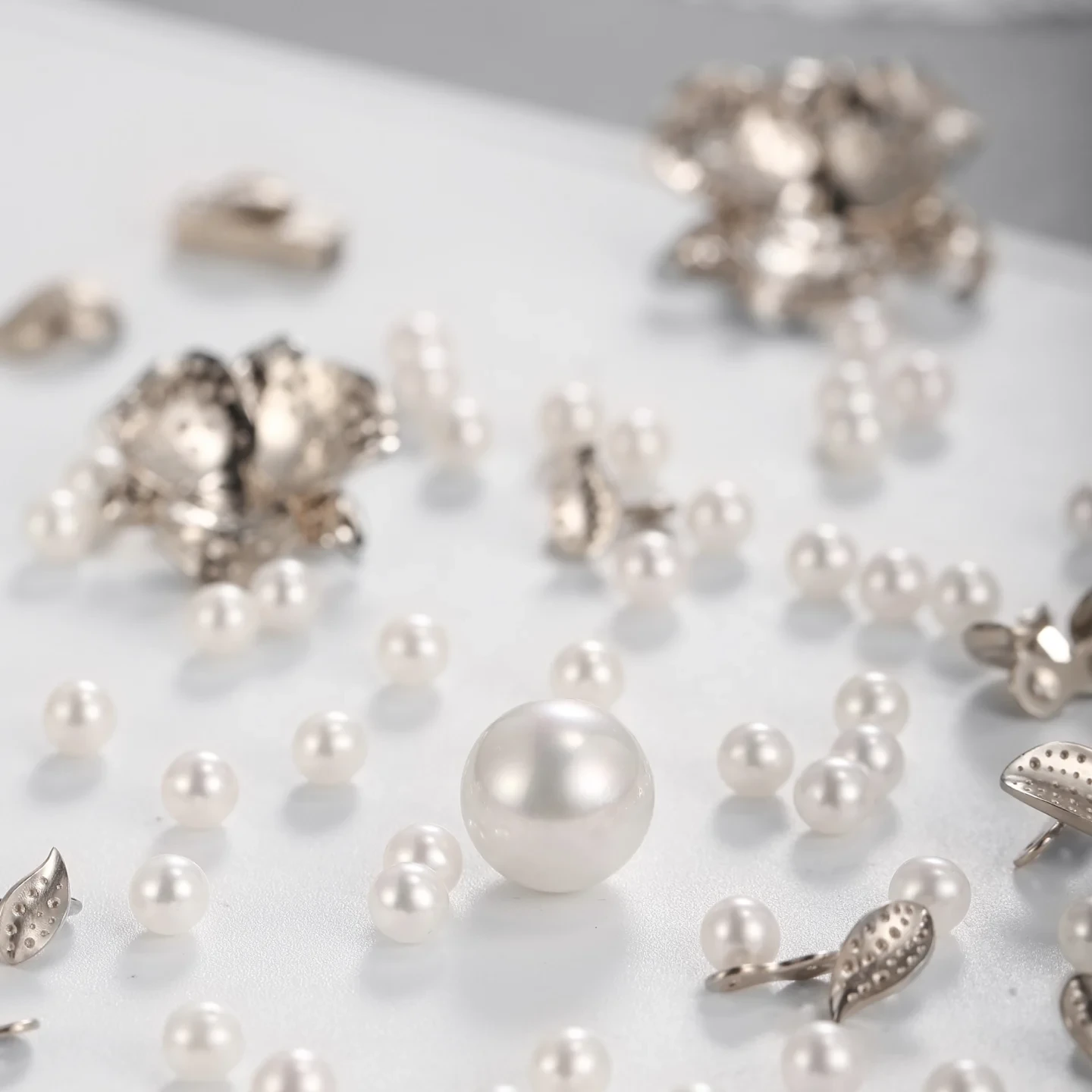 Pearl earrings and accent stones